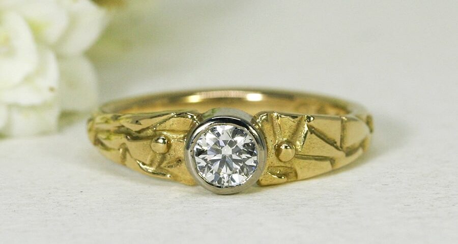 'Adamaris', 18ct fused Yellow Gold band and 18ct White Gold bezel set with 43pt Diamond