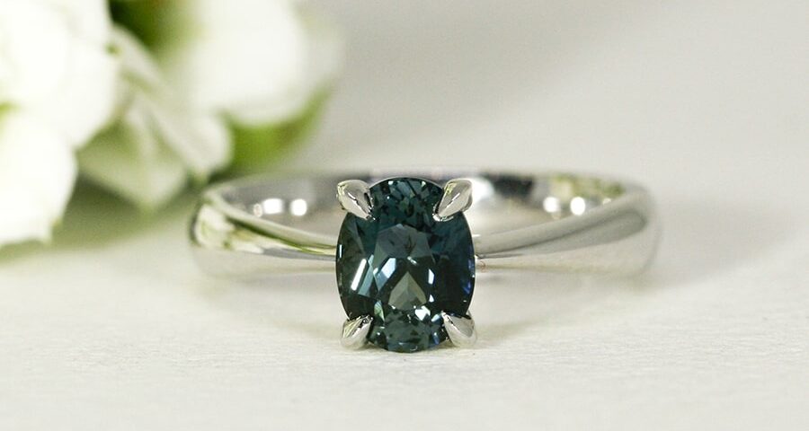 'Ocean Deep', 18ct White and Rose Gold Ring set with Teal Green 1.53ct Sapphire