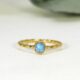 'Tiny Flower', 22ct and 18ct Yellow Gold Ring set with a Coober Pedy Opal
