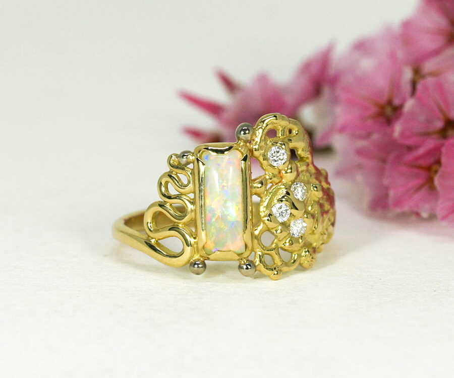 'Dreaming in Colour', 18ct Yellow and White Gold Ring set with a Coober Pedy Opal and four Diamonds