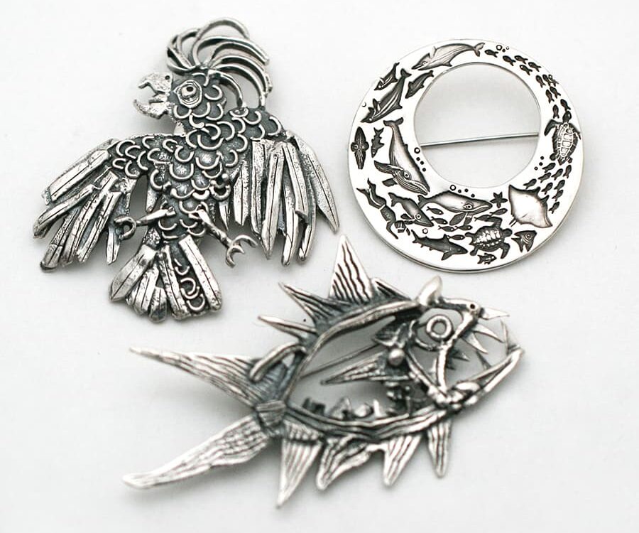 Brooches, fused or stamped
