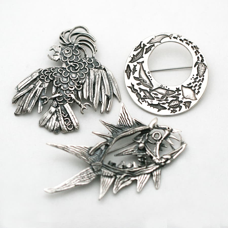 Brooches, fused or stamped