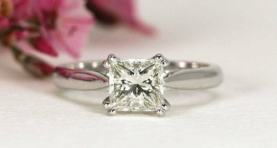 'One and Only', 18ct White Gold Ring set with a 1.1ct Princess Cut Diamond