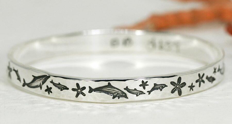 'Dolphin Beat', narrow bangle with beaten finish