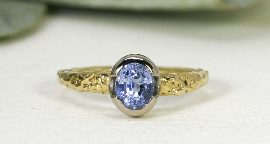 'Daylight Dreaming', 18ct Fused Yellow Gold band and 18ct White Gold Bezel set with a 1.51ct Cornflour Ceylon Sapphire