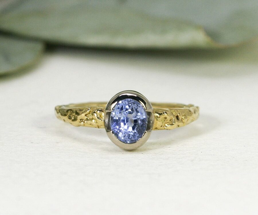 'Daylight Dreaming', 18ct Fused Yellow Gold band and 18ct White Gold Bezel set with a 1.51ct Cornflour Ceylon Sapphire