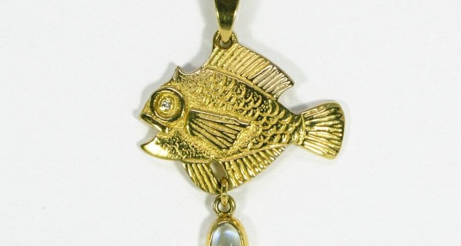 'The Golden Fish', 18ct fused Gold pendant with a Diamond set in the eye and Moonstone drop