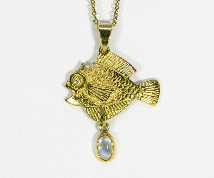 'The Golden Fish', 18ct fused Gold pendant with a Diamond set in the eye and Moonstone drop