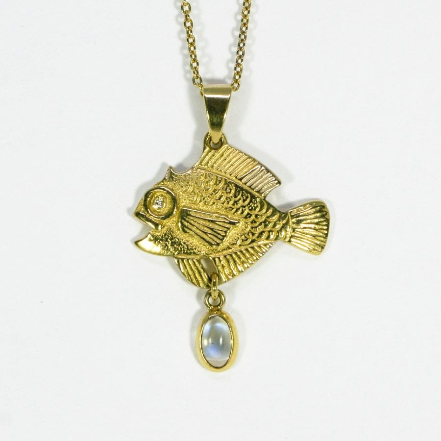 'The Golden Fish', 18ct fused Gold pendant with a Diamond set in the eye and Moonstone drop
