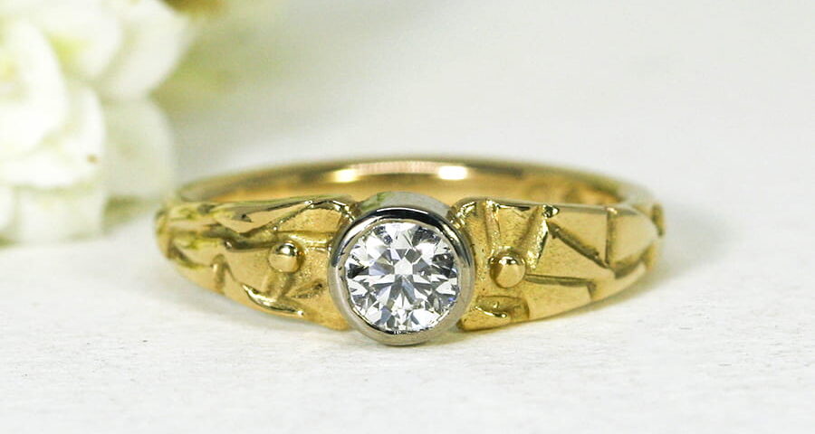 'Adamaris', 18ct fused Yellow Gold band and 18ct White Gold bezel set with 43pt diamond