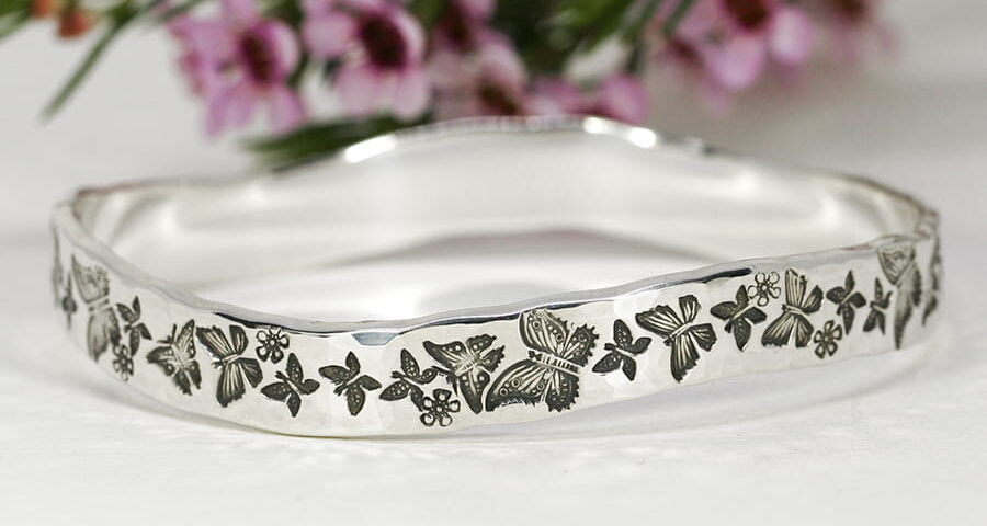 14. 'Butterfly Beauty', Sterling silver bangle with wave and beaten finish