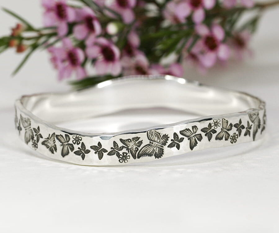 14. 'Butterfly Beauty', Sterling silver bangle with wave and beaten finish
