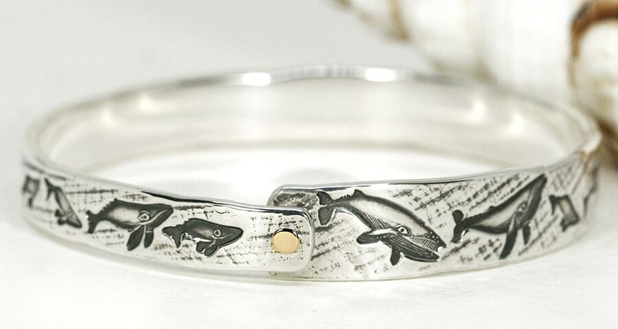 16. 'Humpback Gold', Sterling silver bangle with 18ct yellow gold rivet