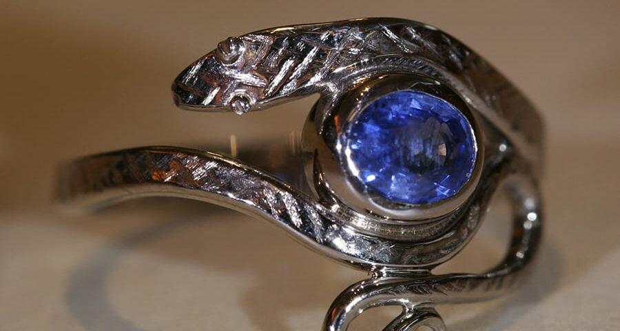 17. 18ct White Gold and Sapphire Snake Ring