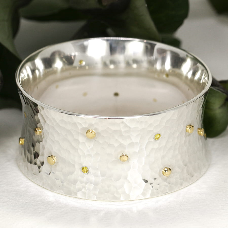 'Guinivere', Sterling Silver bangle with 15x 18ct Yellow Gold Rivets & 8x 10pt Fancy Yellow Diamonds
