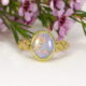23. 'A Ring For Monet', 22ct Yellow Gold, set with a 4ct Semi-Black Opal