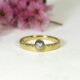 5. 'Golden Cloud', 18ct Yellow Gold Band with 18ct White Gold Bezel, set with a 15pt Diamond
