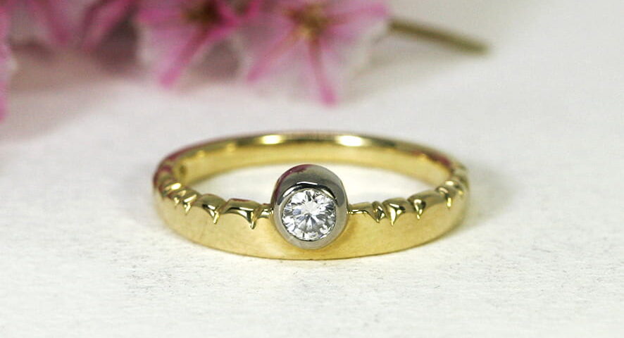 5. 'Golden Cloud', 18ct Yellow Gold Band with 18ct White Gold Bezel, set with a 15pt Diamond