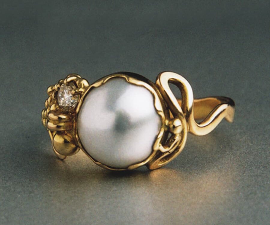 5. 18ct Yellow Gold, Pearl and Diamond ring