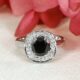 'Beautiful in Black' 18ct white gold ring with black diamond in centre 48 small white diamonds handcrafted john miller design