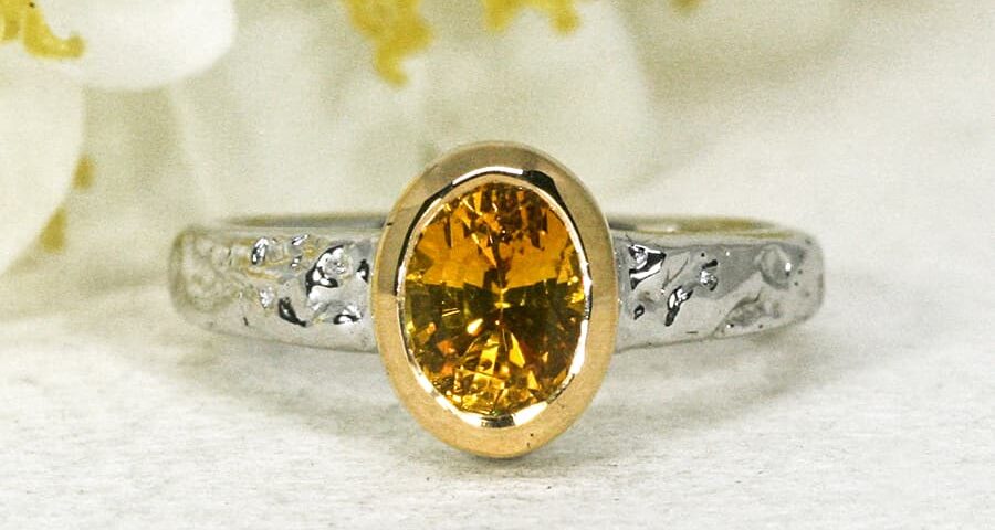 'Hot Summer Nights' 18ct white gold ring set with 1.47ct deep yellow oval sapphire