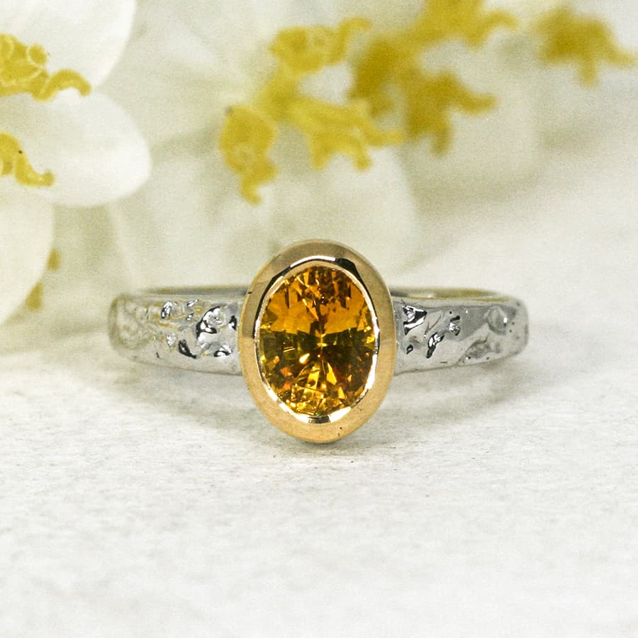 'Hot Summer Nights' 18ct white gold ring set with 1.47ct deep yellow oval sapphire