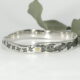 Gum Garden handcrafted sterling silver tapered bangle with gold rivet