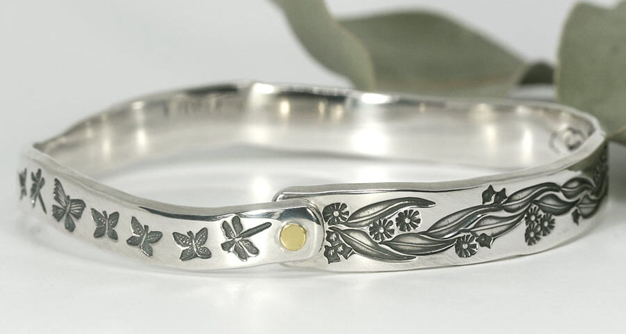 Gum Garden handcrafted sterling silver tapered bangle with gold rivet