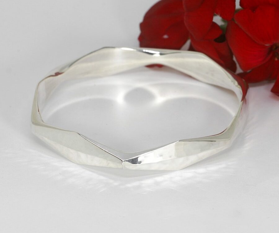 'Bright Facets' handcrafted sterling silver facet bangle with a hammerbeat finish john miller design