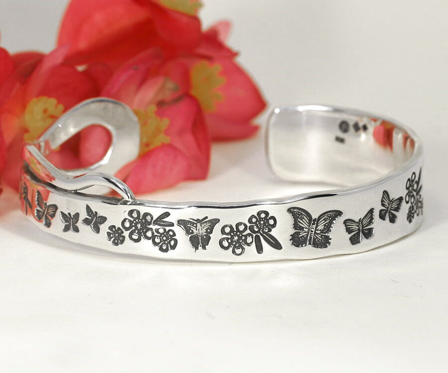 'Something Special Butterflies & Flowers' sterling silver cuff with a something special tail john miller design