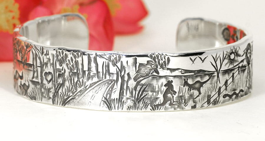 'Southwest Scene' sterling silver cuff featuring forest, aussie farming scene john miller design