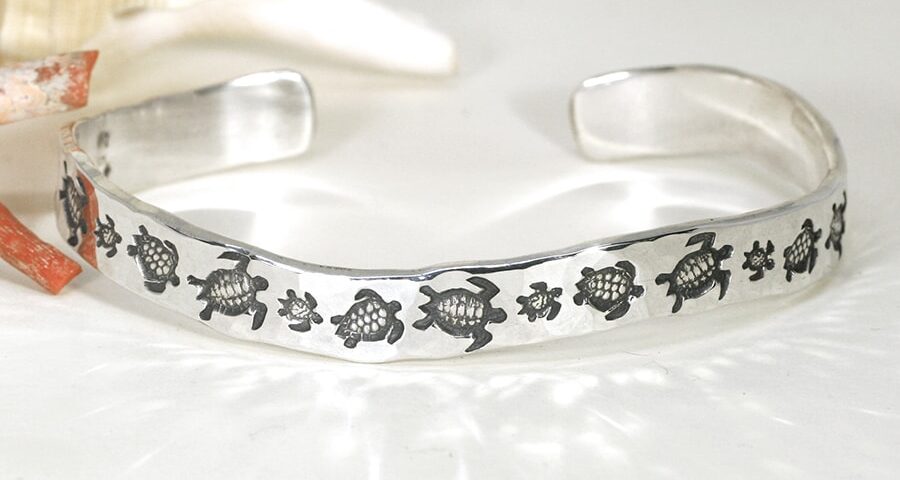 'Turtle Family Swim' sterling silver wavey profile cuff with a hammer beat finish john miller design