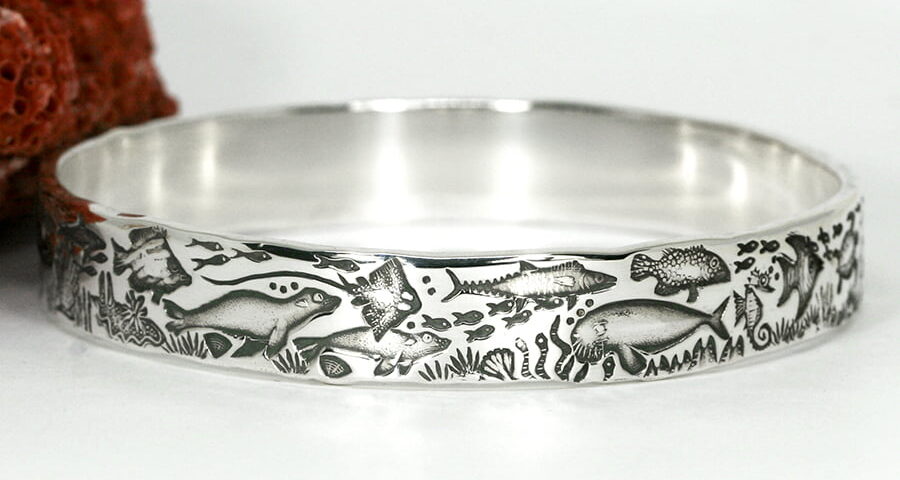 'Underwater Story' sterling silver ocean themed bangle with stamping and hand engraving