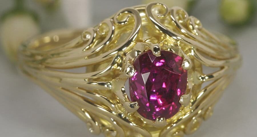 'Gypsy Heart' 18ct yellow gold ring set with 1.2ct oval Burma Ruby john miller design