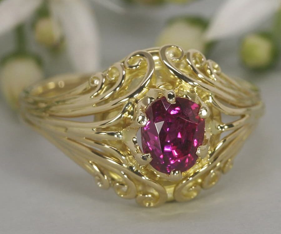 'Gypsy Heart' 18ct yellow gold ring set with 1.2ct oval Burma Ruby john miller design