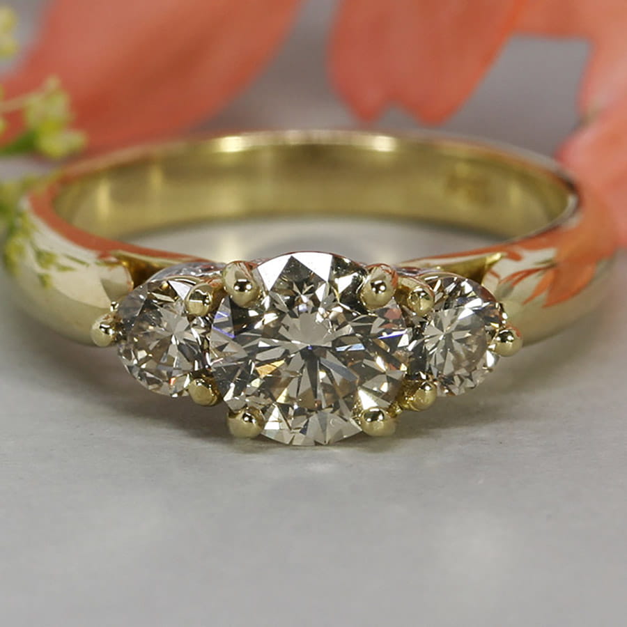 'Romance' 18ct yellow gold ring set with a cognac diamond