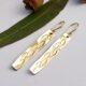 18ct gold Gumleaf earrings