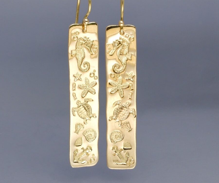 18ct gold Ocean design earrings
