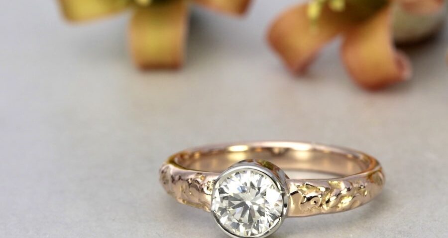 "Champagne Supernova" 18ct fused rose gold ring with champagne diamond in white gold bezel