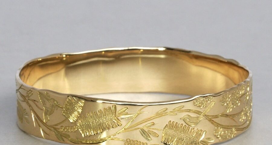 "Garden Delight" 18ct gold bangle with Bottlebrush Geraldton wax and Wrens