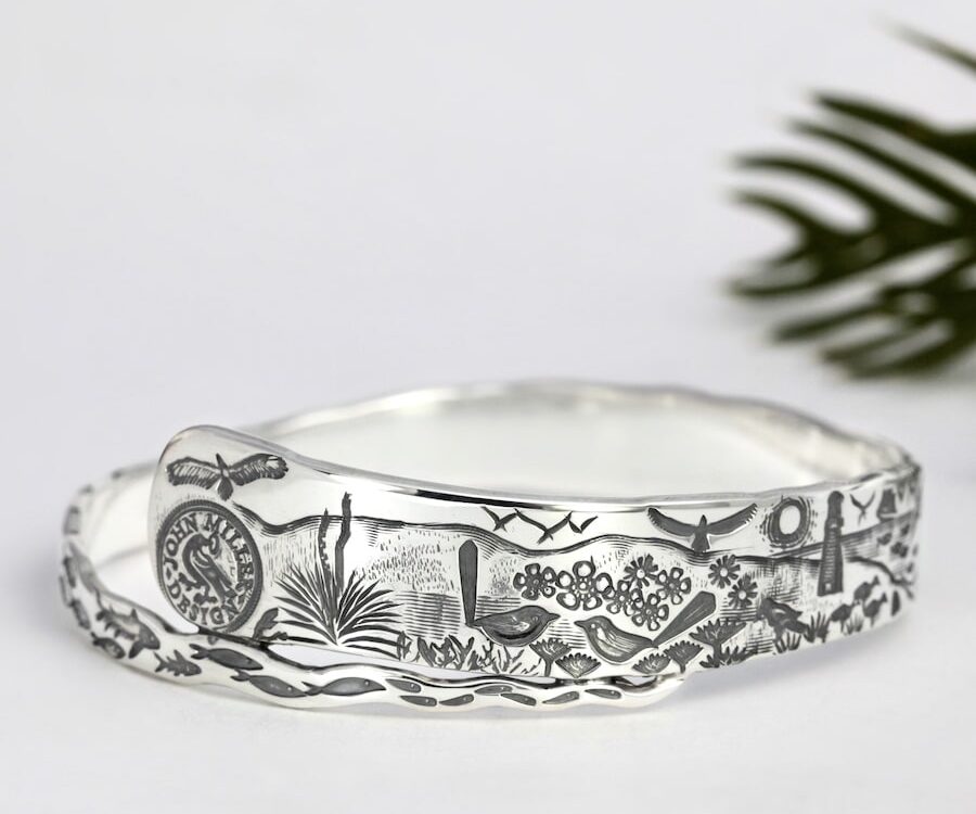 "Tapered Capes Capers" sterling silver spiral bangle with Coastal design