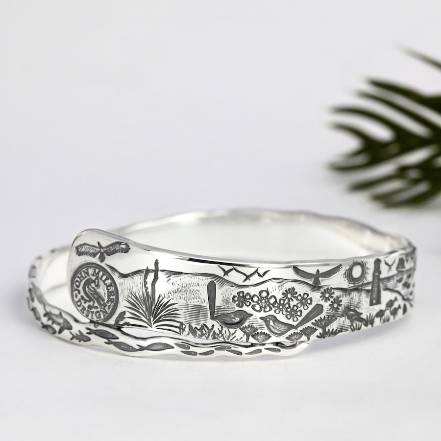 "Tapered Capes Capers" sterling silver spiral bangle with Coastal design
