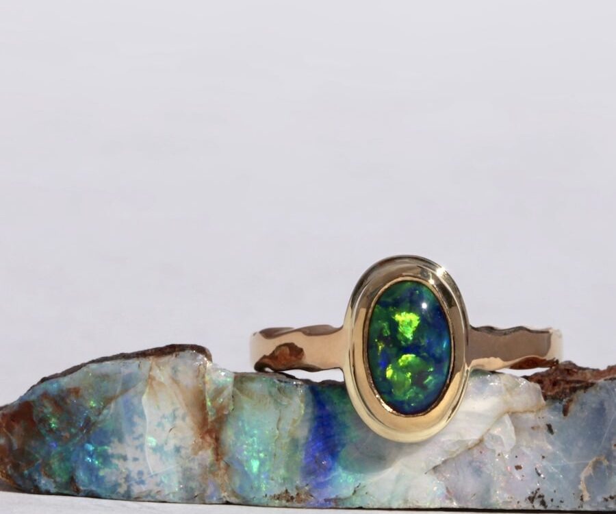 'Black Beauty' gold and opal ring john miller design