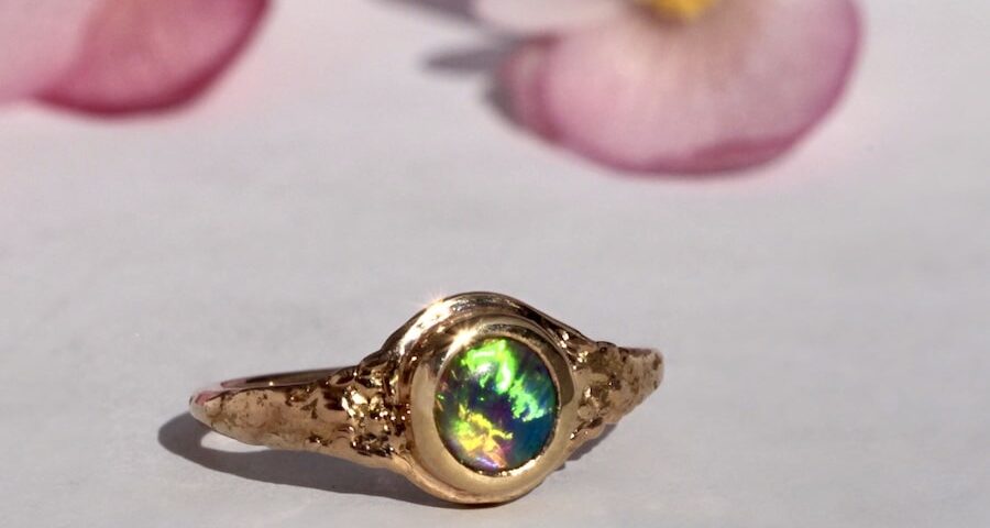 'Aurora' 22ct fused gold ring with Lightening Ridge Opal john miller design