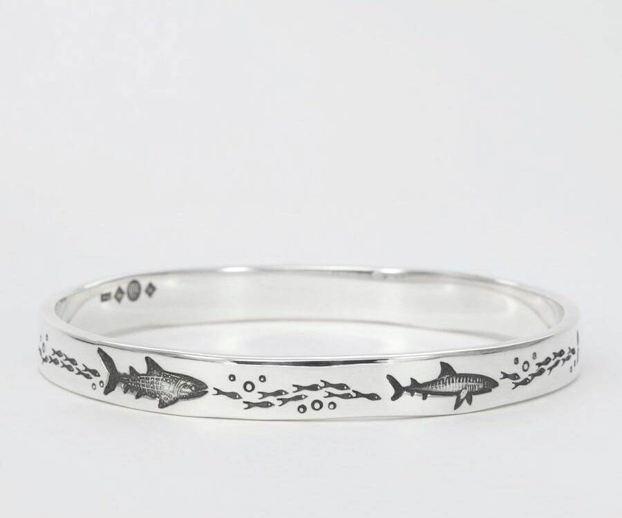 'Shiver of Sharks' sterling silver bangle john miller design