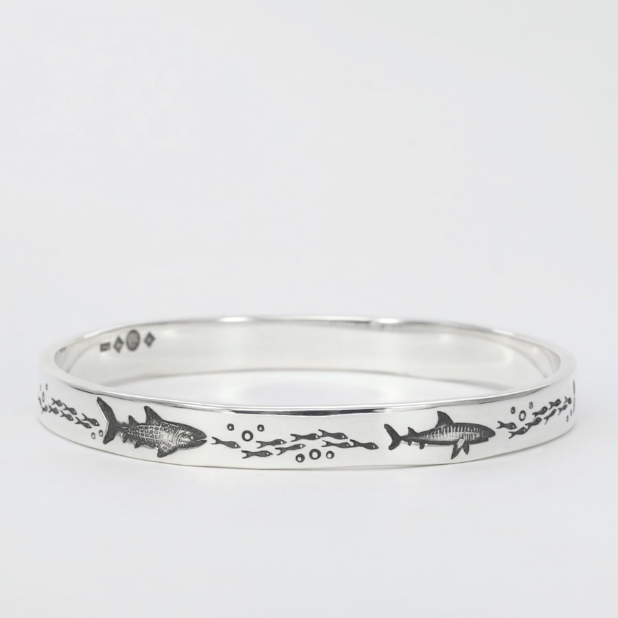 'Shiver of Sharks' sterling silver bangle john miller design