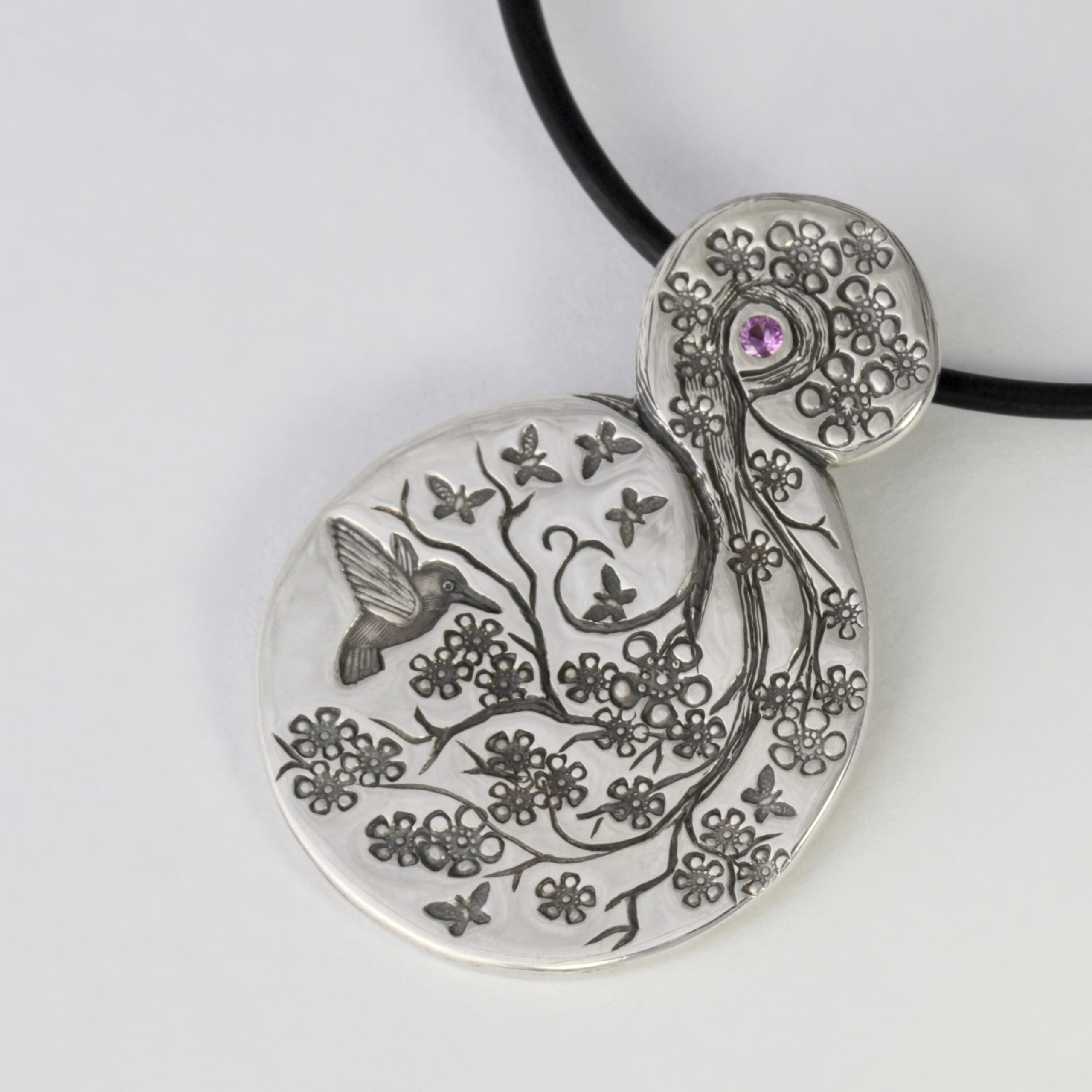 'Garden Swirl' Sterling Silver Flora Fauna Pendant set with a pink sapphire